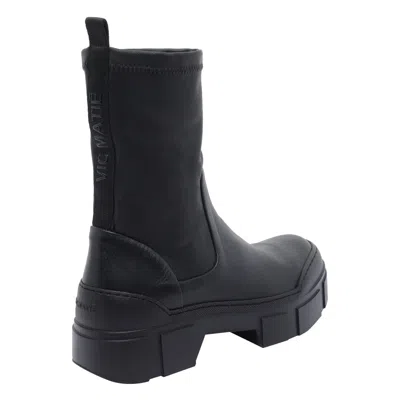 Vic Matie Round Toe Boots In Black