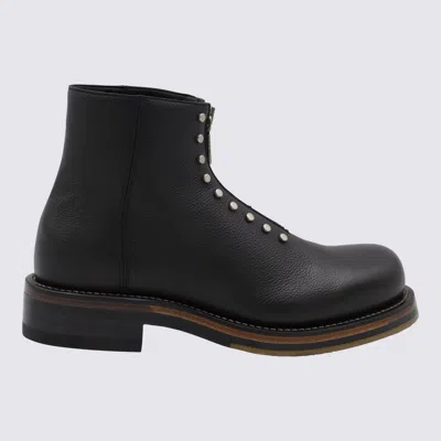 Alexander Mcqueen Chunky Sole Round Toe Studded Ankle Boots In Black