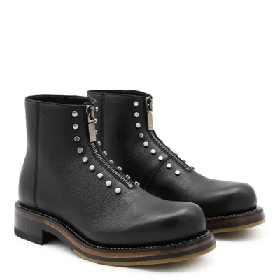 Alexander Mcqueen Chunky Sole Round Toe Studded Ankle Boots In Black