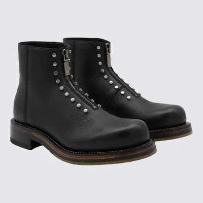 Alexander Mcqueen Chunky Sole Round Toe Studded Ankle Boots In Black