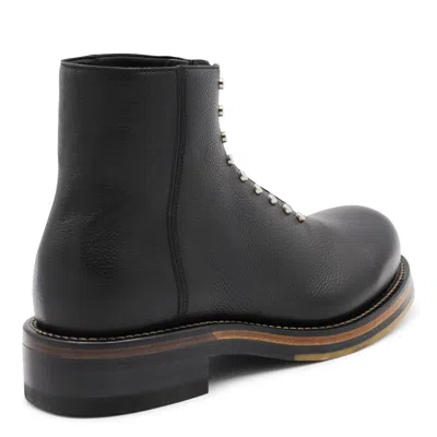 Alexander Mcqueen Chunky Sole Round Toe Studded Ankle Boots In Black