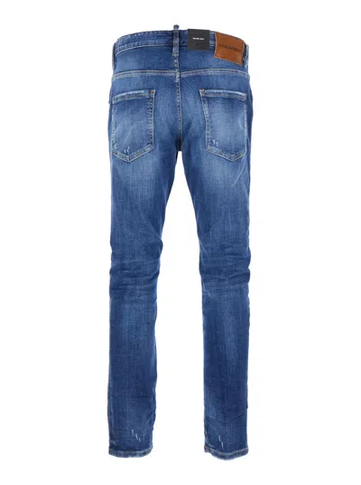 Dsquared2 Blue Jeans With Ripped Details And Logo Patch On The Rear In Denim Man