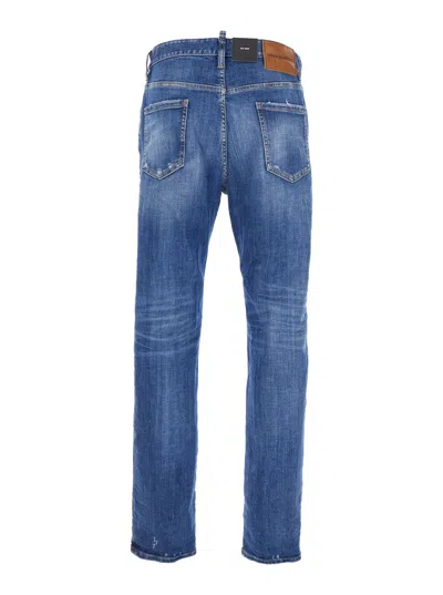 Dsquared2 Blue Jeans With Ripped Details And Logo Patch On The Rear In Denim Man In Blue