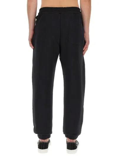 Vivienne Westwood Women Jogging Pants With Spray Print Orb In Black