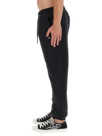 Vivienne Westwood Women Jogging Pants With Spray Print Orb In Black