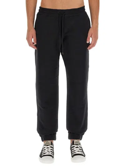 Vivienne Westwood Women Jogging Pants With Spray Print Orb In Black