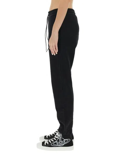 Vivienne Westwood Women Jogging Pants With Spray Print Orb In Black