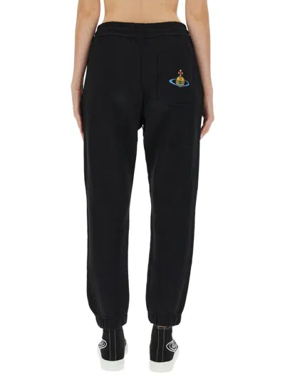 Vivienne Westwood Women Jogging Pants With Spray Print Orb In Black