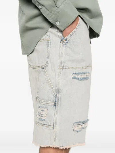 Etudes Studio Distressed Pocket Shorts In Blue