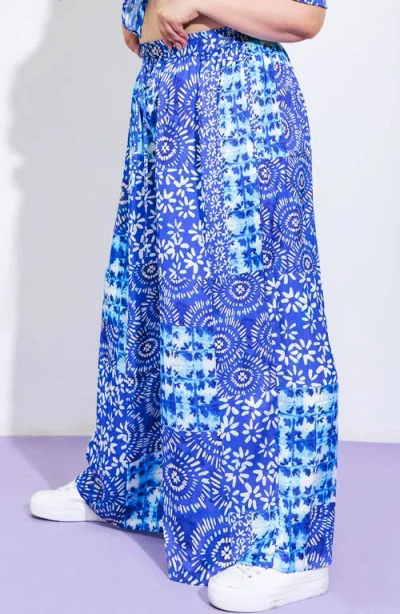 Flying Tomato Print Woven Satin Pants In Blue