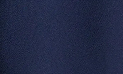 Cece Ruffle Sleeve Tie Neck Top In Blue