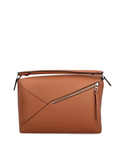 Loewe Puzzle Bag With Geometric Top Handle And Adjustable Strap In Brown