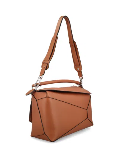 Loewe Puzzle Bag With Geometric Top Handle And Adjustable Strap In Brown