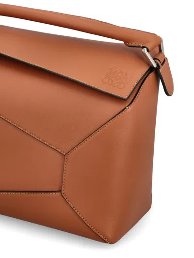 Loewe Puzzle Bag With Geometric Top Handle And Adjustable Strap In Brown