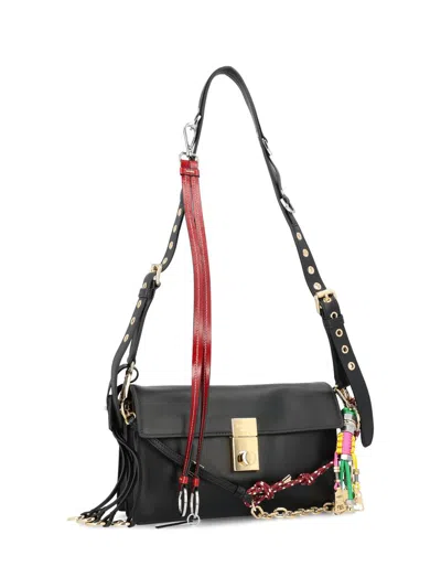 Prada Soft Sound Small Leather Shoulder Bag With Charms In Black
