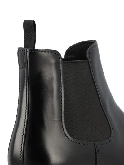 Prada Elastic-gusset Leather Boots In Black