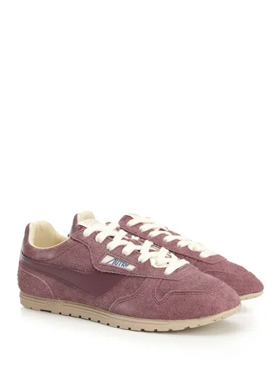 Autry Windspin Sneakers With Used-effect Suede In Pink