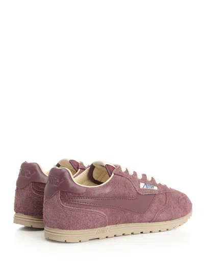 Autry Windspin Sneakers With Used-effect Suede In Pink