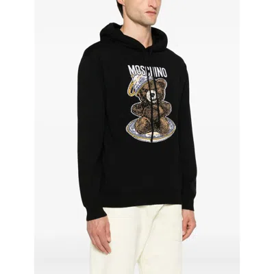 Moschino Wool Sweaters In Black