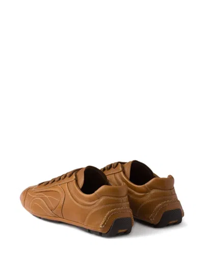 Prada Antiqued Sneakers Aus Leder In Brown
