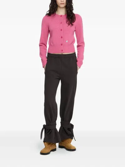 Jw Anderson Tie-fastening Cuffed Trousers In Black