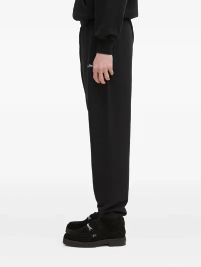 Aries Embroidered Cuffed Track Pants In Black