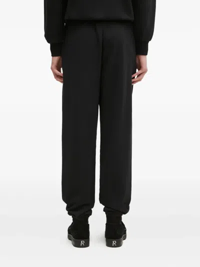Aries Embroidered Cuffed Track Pants In Black