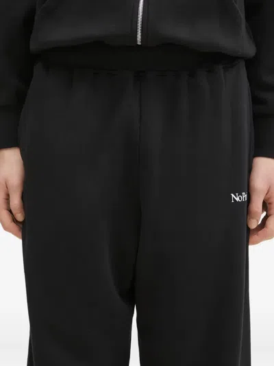 Aries Embroidered Cuffed Track Pants In Black