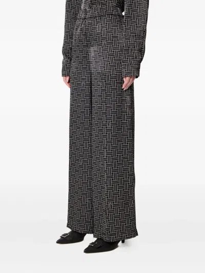 Kenzo Geometric-pattern Trousers In Gray