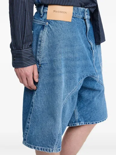 Jw Anderson Twisted Workwear Anchor-patch Denim Shorts In Blue