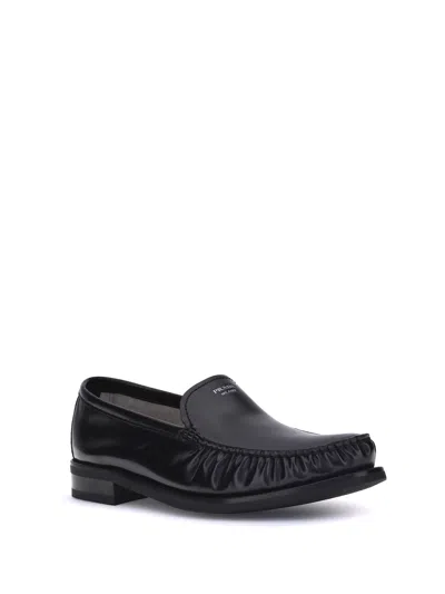 Prada Polished Leather Flat Shoes In Black
