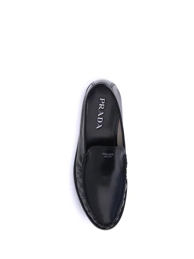 Prada Polished Leather Flat Shoes In Black