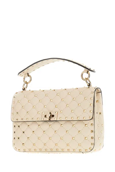 Valentino Garavani Ivory Nappa Leather Medium Rockstud Spike Handbag In Neutral