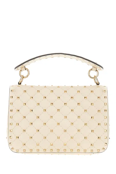 Valentino Garavani Ivory Nappa Leather Medium Rockstud Spike Handbag In Neutral