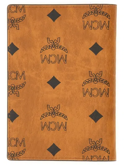 Mcm Monogrammed Passport Holder Foldable Design In Brown