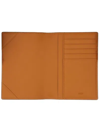 Mcm Monogrammed Passport Holder Foldable Design In Brown