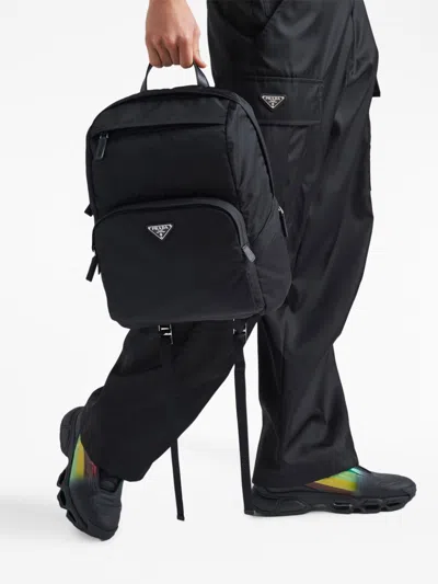 Prada Re-nylon Triangle Logo Backpack In Black