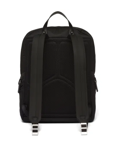 Prada Re-nylon Triangle Logo Backpack In Black