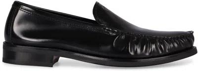 Prada Polished Leather Flat Shoes In Black