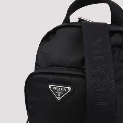 Prada Logo Re-nylon And Saffiano Leather Backpack In Black