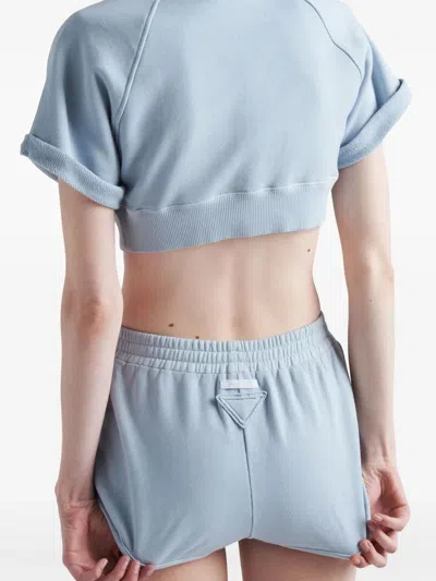 Prada Triangle-patch Jersey Mini Shorts In Blue