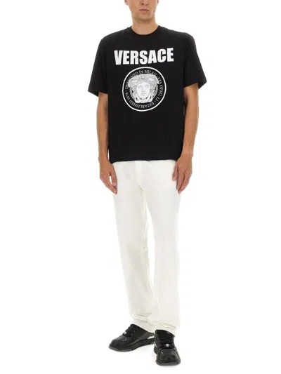 Versace Black Crewneck T-shirt With Maxi Logo Print On The Front