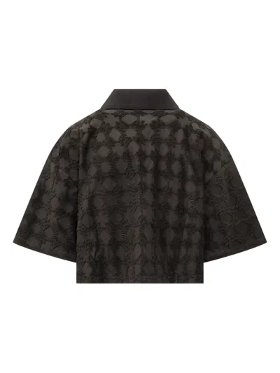Amiri Ma Quad Textured-pattern Polo Shirt In Black