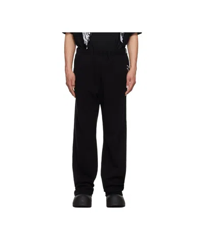We11 Done Piercing Sweatpants In Black