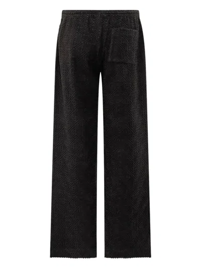 Casablanca Textured-panel Towelling Trousers In Black