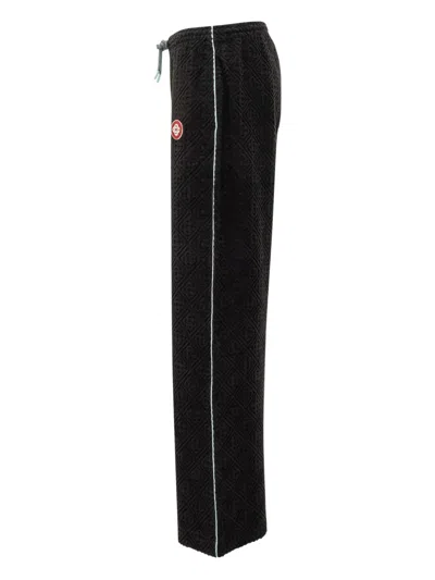 Casablanca Textured-panel Towelling Trousers In Black