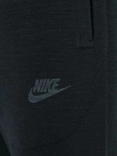 Shop Nike Technical Knit Track Pants