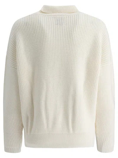 Rakkì Merino Wool Turtleneck Knitwear In Neutral