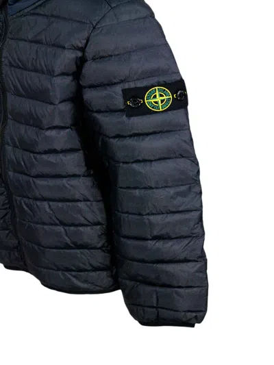 Stone Island 100 Gram Padded Down Jacket Made Of Recycled Crunchy Nylon. Zip Closure, Hood And Logo On The Sleeve In Blue