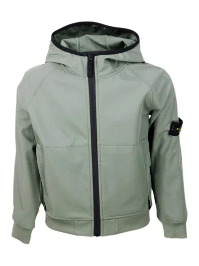 Stone Island Jacket In Water Resistant Technical Fabric With Hood And Zip Closure. Logo Applied On The Sleeve In Gray